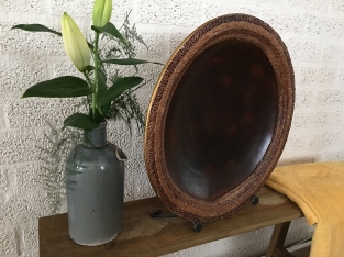 Beautiful Asian earthenware bowl on stand.